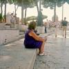 Woman Sat in Rome, Italy